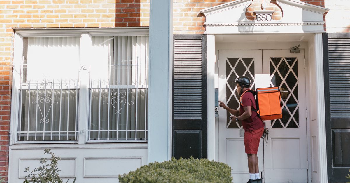 locksmith unlocking front door — Whitestone Locksmith Queens